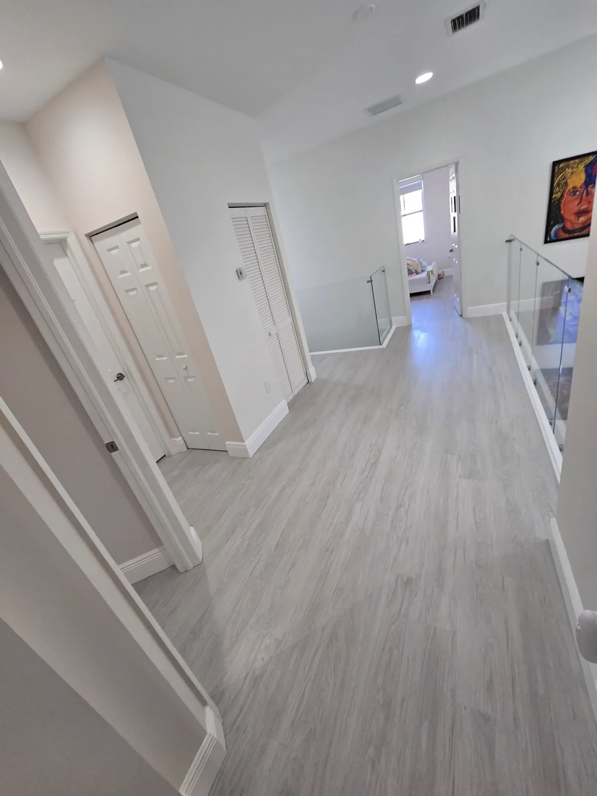 Luxury vinyl plank flooring installed by D'Landra Wooden Floors in South Florida